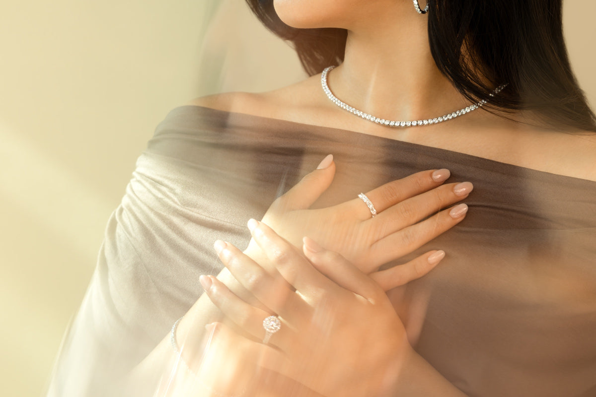 Diamond jewellery worn in warm daylight